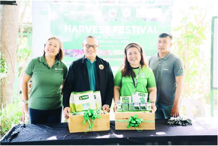 MORE_Power_pic1_resized (From left): MORE Power AVP for Human Capital Management Daphne Karina De Pedro; Iloilo City Government agriculturist Ynigo Garingalao; MORE Power VP for Marketing and Corporate Affairs and Customer Care Department, Ma. Cristina D. Cabalhin, and Allied Botanical’s Erwin Elmido. Garingalao receives seeds from MORE Power and Allied Botanical for the Uswag Nursery. This initiative promotes urban gardening and sustainability in Iloilo City.