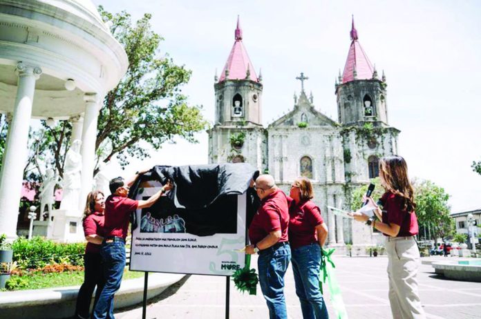 MORE_Power_resized To mark its fifth anniversary of operation in Iloilo City, MORE Electric and Power Corporation (MORE Power) enveiled its Molo Plaza Marker, one of its seven commemorative markers, symbolizing cultural preservation. The famous St. Anne Parish Church can be seen in the background. The marker is a testament to MORE Power’s commitment to heritage conservation through enhanced lighting. Present at the unveiling are MORE Power’s MANCOM, VP, Marketing and Corporate Affairs and Customer Care Department’s Ma. Cristina D. Cabalhin; Engr. Christopher Serojano, Head of Network Operations Group; Niel Parcon, Vice President, Corporate Energy Sourcing and Regulatory Affairs; and AVP for Human Capital Management Daphne Karina De Pedro.