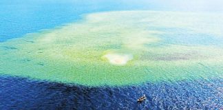 An aerial photo taken by the Philippine Coast Guard shows the wide expanse of Escoda (Sabina) Shoal coveted by China within the Philippines’ exclusive economic zone in the West Philippine Sea. INQUIRER FILES