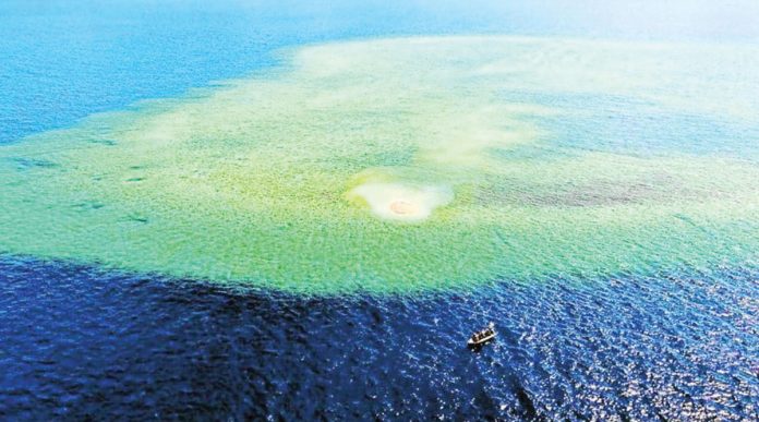 Marcos-1 An aerial photo taken by the Philippine Coast Guard shows the wide expanse of Escoda (Sabina) Shoal coveted by China within the Philippines’ exclusive economic zone in the West Philippine Sea. INQUIRER FILES