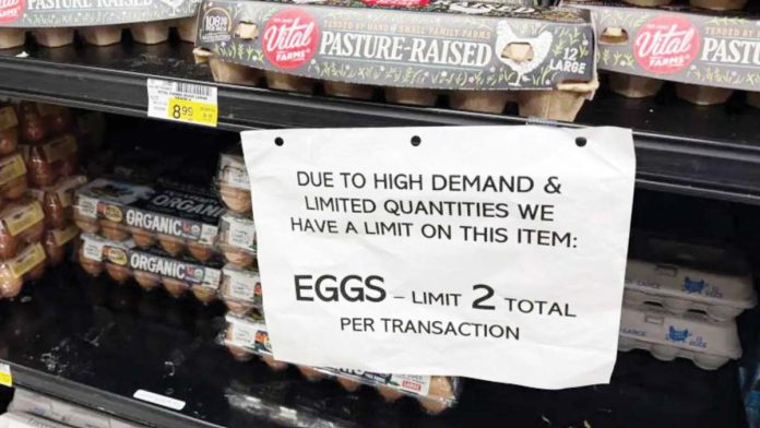 US-1 Signage notes a limit due to limited quantities of eggs at a grocery store in Manhattan Beach, California. GETTY IMAGES