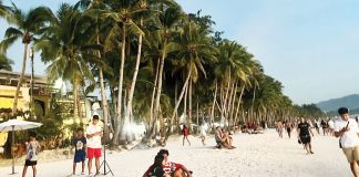 Visitors to Boracay Island pay P150 each in terminal and environmental fees, plus an additional environmental fee upon departure, alongside boat fare costs. MAI LADIAO PHOTO