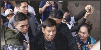 Former president Rodrigo Duterte arrives inside the Southorn Stadium during a thanksgiving gathering organized by Hong Kong-based Filipino workers for the former populist president in Hong Kong on Sunday, March 9. The following day upon his return to Manila, Duterte was arrested upon the order of the International Criminal Court for the charge of “crimes against humanity”. AP