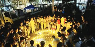 The Iloilo Provincial Government spearheads “Ligum-Dulom”, an Earth Hour observance, at the capitol lobby on March 22 from 8:30 p.m. to 9:30 p.m. Photo shows participants lighting candles in the shape of the Earth Hour symbol at the capitol ground in March last year. EMB 6 PHOTO