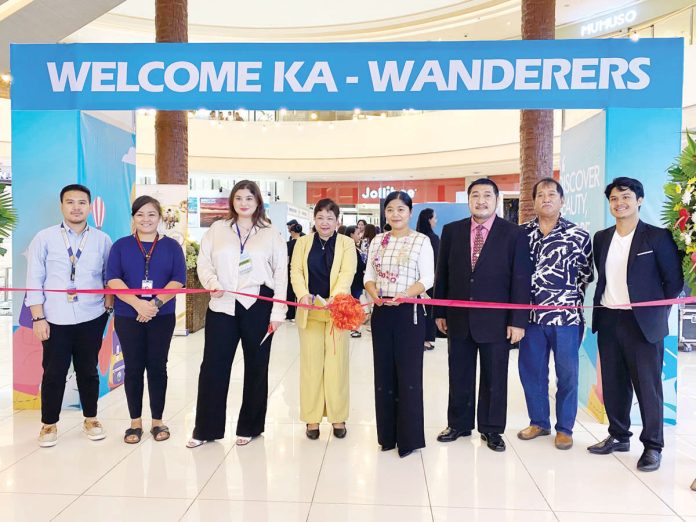 expo1_resized Key figures from the travel and tourism industry gather at the opening of the World Travel Expo – Western Visayas at Festive Walk Iloilo in Mandurriao, Iloilo City. Photo shows (from left) Paul Martin (Festive Walk Mall), Andrea Guanco (President, Iloilo Bloggers Society), Miles Caballero (Managing Director, Ad Asia Events Group), Teuila Metcalfe (Director of Corporate Marketing, Club Wyndham Asia), Crisma Rodriguez (Regional Director, DOT-6), Edwin Raymundo (former President, Boracay Foundation), and Admiral Leonard Tirol and Yev Gelito (Board of Directors, Boracay Foundation). AJ PALCULLO PHOTO