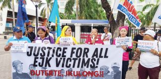 Ilonggo human rights activists stage a protest in Iloilo City upon learning of the arrest of former president Rodrigo Duterte in Metro Manila on March 11. The demand justice for victims of extrajudicial killings under the Duterte administration. IME SORNITO/PN