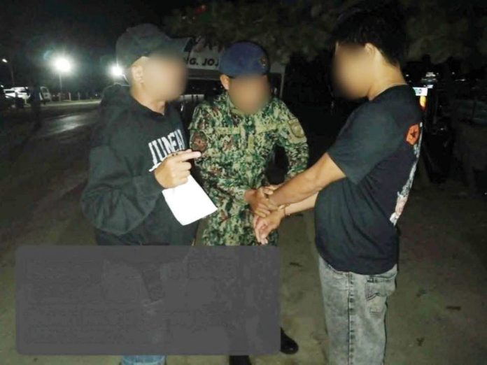 mai_fugitive_1_resized Policemen handcuff this 41-year-old construction worker from Jaro, Iloilo – a rape suspect and Western Visayas’ No. 5 most wanted person. The arrest took place in Barangay Yapak, Boracay Island in Malay, Aklan on March 3. PRO-6 PHOTO