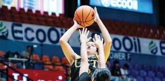 Sandra Abrantes of the University of Santo Tomas Junior Growling Tigresses goes for an inside hit. UAAP PHOTO