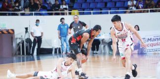 Basilan Viva Portmasters’ Gab Dagangon picks the ball away from a Valenzuela Classic Dynacast player. MPBL PHOTO