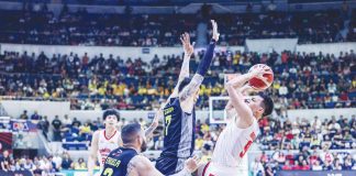 Barangay Ginebra San Miguel Kings’ Earl Scottie Thompson is forced to a tough shot by the defense of TNT Tropang Giga’s John Paul Erram. PBA PHOTO
