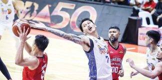 TNT Tropang Giga’s John Paul Erram tries to steal the ball away from Barangay Ginebra San Miguel Kings’ Earl Scottie Thompson. PBA PHOTO