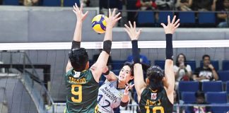 National University Lady Bulldogs’ Alyssa Solomon tries to score against the defense of Far Eastern University Lady Tamaraws’ Chen Tagaod. UAAP PHOTO