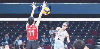 Adamson University Lady Falcons’ Shaina Nitura scores against a defender from University of the East Lady Warriors. UAAP PHOTO