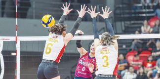 Choco Mucho Flying Titans’ Dindin Santiago-Manabat smashes the ball towards the defense of PLDT High Speed Hitters’ Savannah Davison. PVL PHOTO