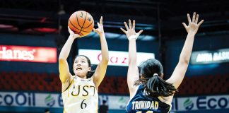Negrense Barby Dajao of the University of Santo Tomas Junior Growling Tigresses goes for an inside hit. UAAP PHOTO