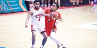 Ilonggo Juan Paolo Taha of NorthPort Batang Pier eludes the defense of Barangay Ginebra San Miguel Kings’ Rhon Jay Abarrientos for an inside hit. PBA PHOTO