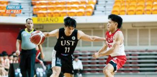 University of Santo Tomas Growling Tigers’ Rence Padrigao wards off a University of the East Red Warriors’ defender. Photo courtesy of Pinoyliga
