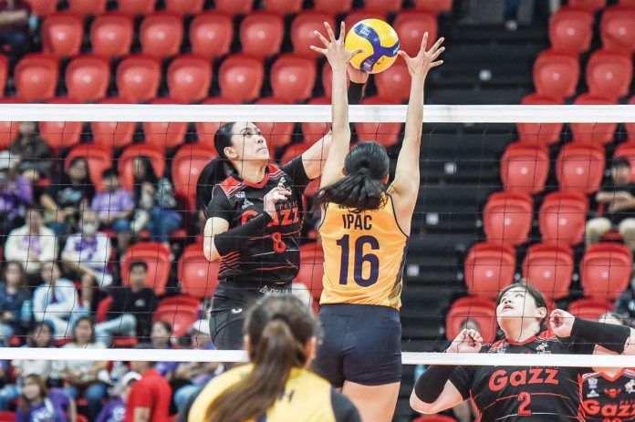 sports_Petro_resized Ilongga Aiza Maizo-Pontillas of Petro Gazz Angels unloads an attack against the defense of Capital1 Solar Energy Solar Spikers' Norielle Ipac. PVL PHOTO