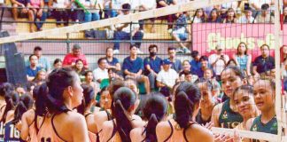 Members of the University of San Carlos’ Lady Warriors and University of Southern Philippines Foundation Inc.’s Lady Panthers during their recent CESAFI competition. V-LEAGUE PHOTO