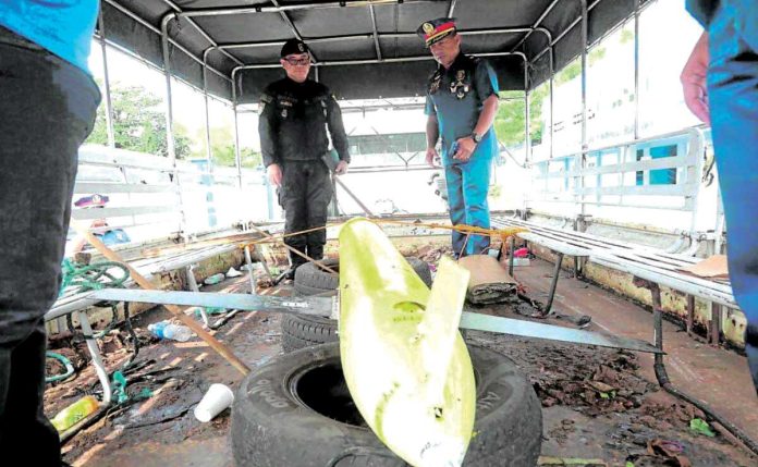 Drones-copy Five underwater drones were recovered in various parts of the country last year, according to Philippine Navy spokesperson for the West Philippine Sea Rear Adm. Roy Vincent Trinidad. Bicol police chief Brig. Gen. Andre Dizon inspects a submersible drone recovered by fishermen in San Pascual town, Masbate province, on January 1, 2025. The drone was later turned over to the Philippine Navy unit in southern Luzon. PHOTO FROM BICOL POLICE