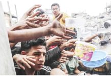 UN agency runs out of food aid in Gaza after Israeli blockade Displaced Palestinians hold out pans at a community kitchen in Jabalia refugee camp, northern Gaza. Palestinians have been relying on community kitchens, like this one in Jabalia, to provide around one million hot meals daily. GETTY IMAGES