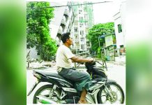 TikTok astrologer arrested for predicting new Myanmar quake A man in a white shirt rides a motorcycle past a collapsed grey building in Myanmar a few days after a recent strong earthquake. GETTY IMAGES