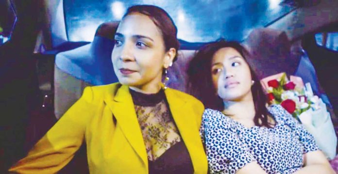 Rosas_1_resized Lawyer Yan Cortum (far right) plays Gemma, a woman whose birthday takes an unexpected turn after heartbreak, only to find empathy and connection with newfound friend Claire (left), played by singer Taw Muhammad, in “Isa ka Pungpong nga Rosas”. SCREENSHOT FROM THE FILM “ISA KA PUNGPONG NGA ROSAS”