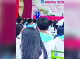 Venus Divinia Nietes, principal of Col. Roperto Abellon National School in Laua-an, Antique, orders the graduating senior high school learners to remove their togas, saying it was not the prescribed uniform for their graduation ceremony, on Tuesday, April 15, 2025.