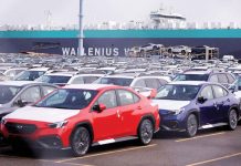 Factories around the world brace for Trump tariffs Newly manufactured cars of an automobile maker awaiting export are parked at a port in Yokohama, south of Tokyo, Japan March 27, 2025. REUTERS/ ISSEI KATO/ FILE PHOTO