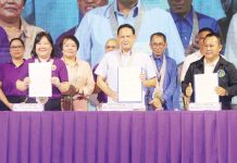 Legal aid, law lectures to reach teen centers in Iloilo Province Gov. Arthur Defensor Jr. (center), Central Philippine University - College of Law Dean Atty. Aila Rae Endonila (left), and Iloilo Schools Division of Iloilo Superintendent Ernesto Servillon Jr. (right) proudly hold up the signed memorandum of agreement for the alaLAYI: Pag-ubay Legal sa Kabataan program during its official launch at the Iloilo Provincial Capitol lobby on Tuesday, April 8. The initiative, part of the 124th Semana sang Iloilo celebration, aims to deliver legal aid and education to teen centers across the province. AJ PALCULLO/PN