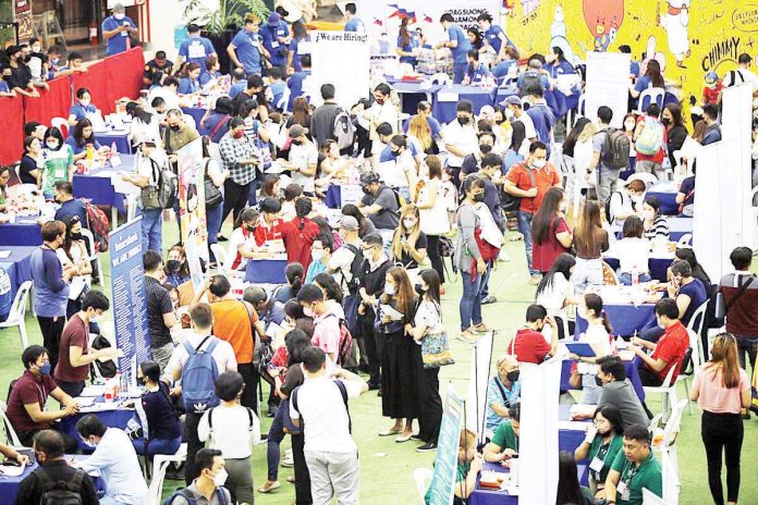 jobs_fair_resized The unemployment rate in the Philippines fell to 3.8 percent in February, from 4.3 percent the month before. GMA NEWS PHOTO