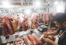 A butcher arranges various pork cuts at a stall inside the Arranque Market in Sta. Cruz, Manila in this file photo. The Department of Agriculture on Monday, April 21, 2025, said it has revived the Livestock Data Analytics Group to protect producers and consumers through data-driven planning, analysis, forecasting and creation of policies. PNA PHOTO BY YANCY LIM