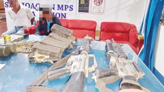 Western Visayas’ No. 8 most wanted person, Jelly Solinap from Barangay Tuy-an East, Maasin, Iloilo, was arrested in Barangay Jawod, San Joaquin town, on April 12, 2025. He yielded high-powered firearms and ammunition. RADYO TODO ILOILO PHOTO