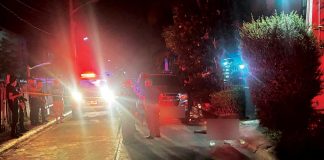 Police cordoned off the area at a subdivision in Barangay Ungka II, Pavia, Iloilo where Wilmer Casquite Villarosa was shot to death on Thursday night, April 3, 2025. PAVIA MPS PHOTO