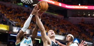 Indiana Pacers’ Bennedict Mathurin battles Milwaukee Bucks’ Brook Lopez for the rebound. GETTY IMAGES