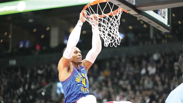 sports_NBA_copy_resized Denver Nuggets' Russell Westbrook soars for a two-handed dunk. Photo Courtesy of John E. Sokolowski/Imagn Images