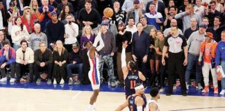 Detroit Pistons' Dennis Schröder connects a three-pointer against the defense of New York Knicks' Jalen Brunson. ESPN PHOTO