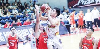 Rain or Shine Elasto Painters’ Adrian Nocum attacks the defense of NorthPort Batang Pier’s Cade Flores for an inside hit. PBA PHOTO