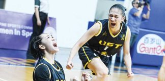 Negrenses Kent Jane Pastrana and Gil Relliquette of University of Santo Tomas Growling Tigresses reacts after their Game 2 win. WMPBL PHOTO
