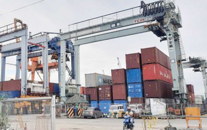 Shipping containers are seen at the Port of Cebu in this undated photo. An official of EastWest Banking Corp. said Thursday, April 24, 2025, that the spike in US tariff rates causes market uncertainties but plays a factor in another rate cut by the Bangko Sentral ng Pilipinas. PNA FILE PHOTO
