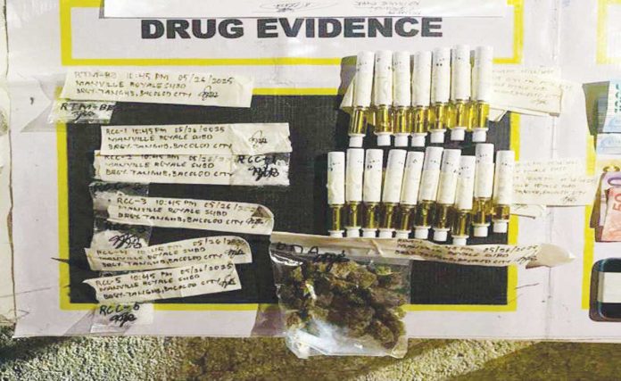 BCPO_seize_over_P500K_worth_of_‘shabu’,_marijuana_in_drug_bust_resized Suspected shabu, dried marijuana leaves, and liquid marijuana cartridges were confiscated by the Bacolod City Police Office from three suspects in a buy-bust operation in Barangay Tangub, Bacolod City, on May 26, 2025. BCPO PHOTO