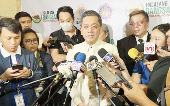 Comelec_1_resized Chairman George Erwin Garcia heads the Commission on Elections, an independent constitutional commission. He is not a member of the Marcos Cabinet.