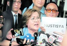 Former senator Leila de Lima talks to reporters outside the Muntinlupa City Hall of Justice in Muntinlupa City in this June 24, 2024 file photo after the court cleared her of the third and last charge of conspiracy to commit drug trading. INQUIRER PHOTO/GRIG C. MONTEGRANDE