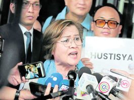 Former senator Leila de Lima talks to reporters outside the Muntinlupa City Hall of Justice in Muntinlupa City in this June 24, 2024 file photo after the court cleared her of the third and last charge of conspiracy to commit drug trading. INQUIRER PHOTO/GRIG C. MONTEGRANDE