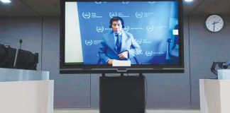 Former Philippine President Rodrigo Duterte is seen via video link in the courtroom of the International Criminal Court (ICC) in The Hague, Netherlands in this photo taken on March 14, 2025. AP