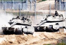 File photo showing Israeli tanks entering Israel from Gaza. The Israeli military has called up tens of thousands of reservists, saying it is aiming to increase pressure on Hamas. REUTERS