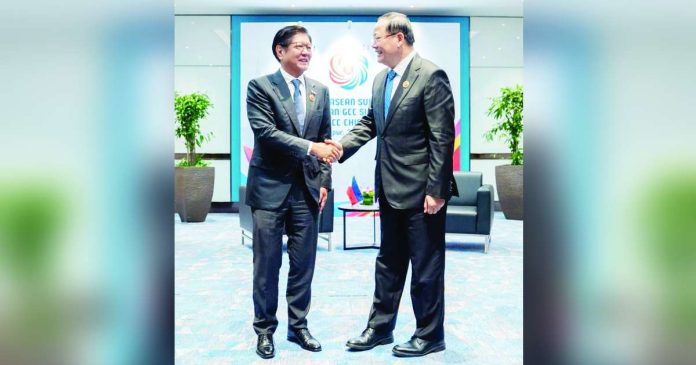 Marcos 1_superimposed President Ferdinand “Bongbong” Marcos Jr. and Lao Prime Minister Sonexay Siphandone meet at the sidelines of the 46th Association of Southeast Asian Nations’ Summit in Malaysia. PCO