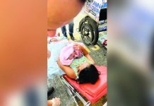 The safety officer of the Bacolod City’s Office of Building Administrator assisted the emergency delivery of a mother at the parking lot of the Bacolod City Government Center on Monday morning, May 5, 2025. BACOLOD CITY PIO PHOTO