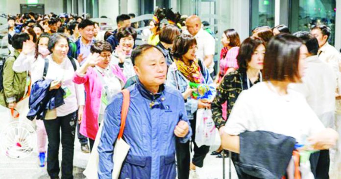 The Department of Tourism is in close coordination with the South Korean government to “retain confidence among South Koreans” visiting the country. Photo shows South Korean visitors arriving at the Mactan-Cebu International Airport. DOT PHOTO