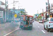 A passenger jeep emits black smoke as it traverses E. Rodriguez Sr. Avenue, Quezon City. According to the Department of Transportation, all drivers of public utility vehicles will now be required to undergo mandatory drug testing. PNA